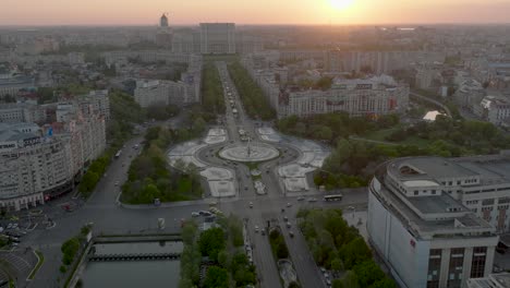 unirii boulevard, union square and unipn park with city views during sunset in bucharest, romania. - aerial
