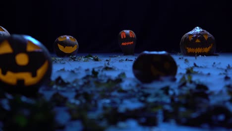 happy halloween landscape in dark night with scary pumpkins