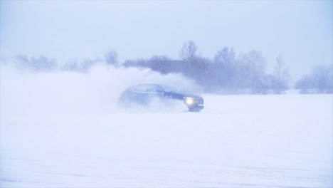 car drifting on a snowy field