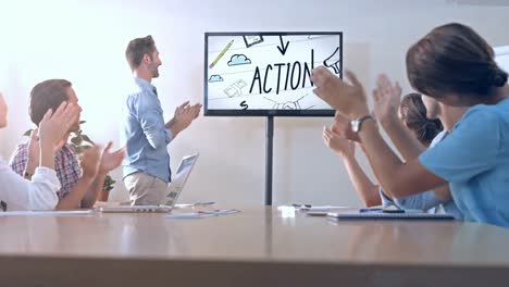 team of executives clapping at the presentation in the conference room