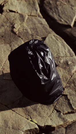 plastic bag on rocks