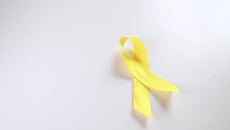 Yellow-ribbons-signifies-mainly-for-suicide-prevention-and-liver-disease-and-cancer-awareness,-especially-in-children