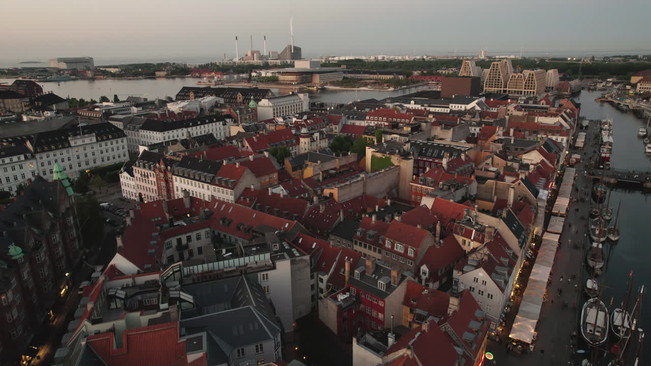 King's Square and New Harbor Aerial View in the Evening, Featuring People and Cityscape with a Charming Illumination