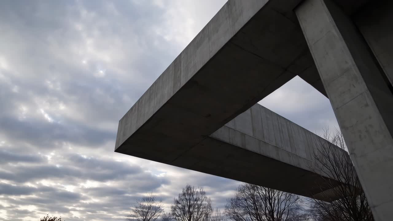 Architectural Concrete Structure Against Cloudy Sky