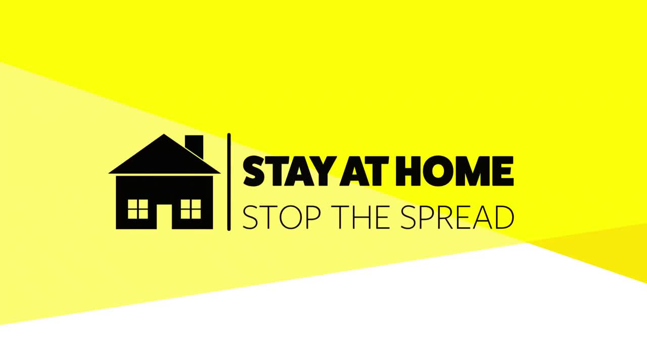 집에 머물라는 단어의 애니메이션은 노란색 뒷면에 검은색 집 윤 ⁇ 으로 쓰여진 확산을 멈추십시오.