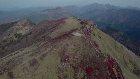 drone flight over mt miune in shikoku, japan during autumn