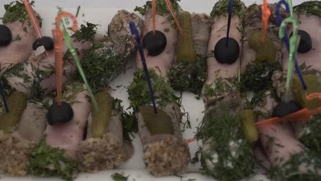 festive table is served with meat rolls