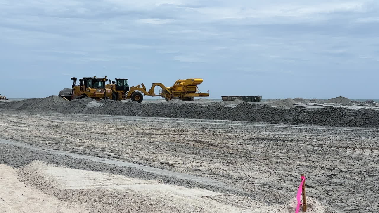 Beach stabilization project, sand replenishment, construction equipment