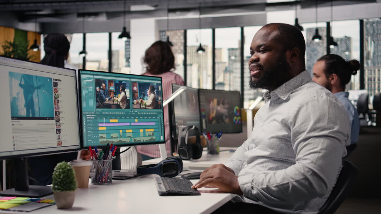 Portrait of african american man working on film montage editing