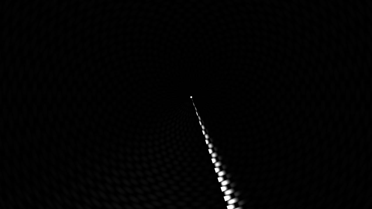 Una vista mostra la luce che si muove attraverso uno spazio buio, con punti luminosi che appaiono lungo un percorso. La scena crea un senso di profondità e movimento, attirando lo sguardo verso la luce che si trova più avanti