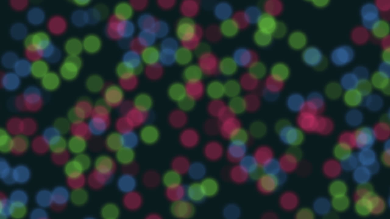 Glitter e bokeh arcobaleno su spazio scuro