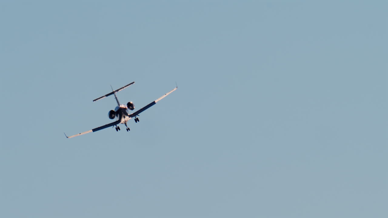 An aircraft flying through a clear sky