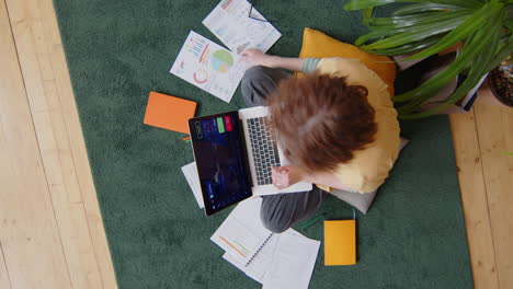 female freelancer working with financial data from home