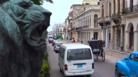 Traffic-passes-on-the-streets-of-the-old-city-of-Havana-Cuba-with-classic-old-cars-