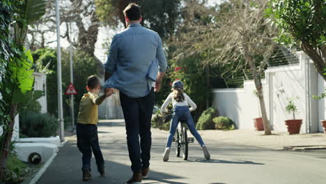 a young girl riding her bike while outside
