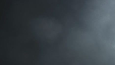 realistic smoke / fog / gas moving fast, ascends, filling black background. real lens flare that is easy to use in blend / overlay modes.