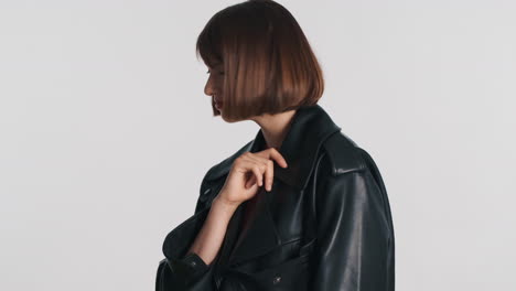 Young-woman-waving-good-bye-and-moving-in-studio