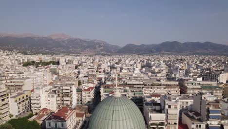 Drone-pullback-over-Cathedral-of-Saint-Andrew,-Greek-Orthodox-basilica,-Patras