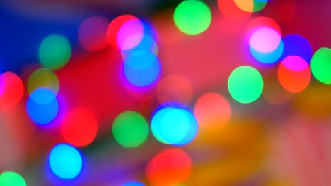 luces de colores borrosos. rojo, verde, amarillo, naranja, azul desenfocado bokeh brillante fondo festivo.