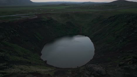 kerid crater, beautiful tourist attraction in iceland at sunset, aerial