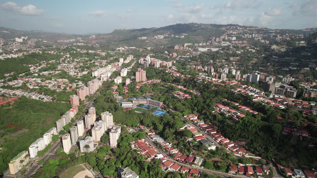 Panning drone of Santa Paula neighborhood showing rooftops and urban pattern