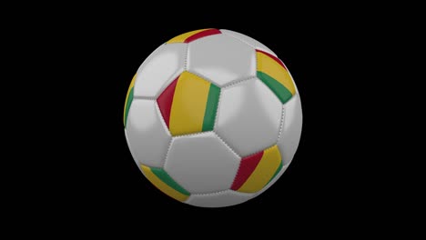 pelota de fútbol con bandera de guinea bucle 4k con alfa