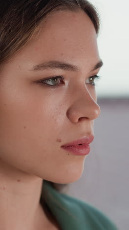 exhausted woman feels offence on rainy day closeup. pretty lady stands on roof seeking for tranquility and emotional pain relief. unstable mental health