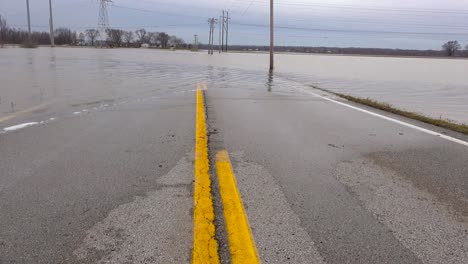 tilt up of flooding washing out a road during intense storms in missouri in 2016