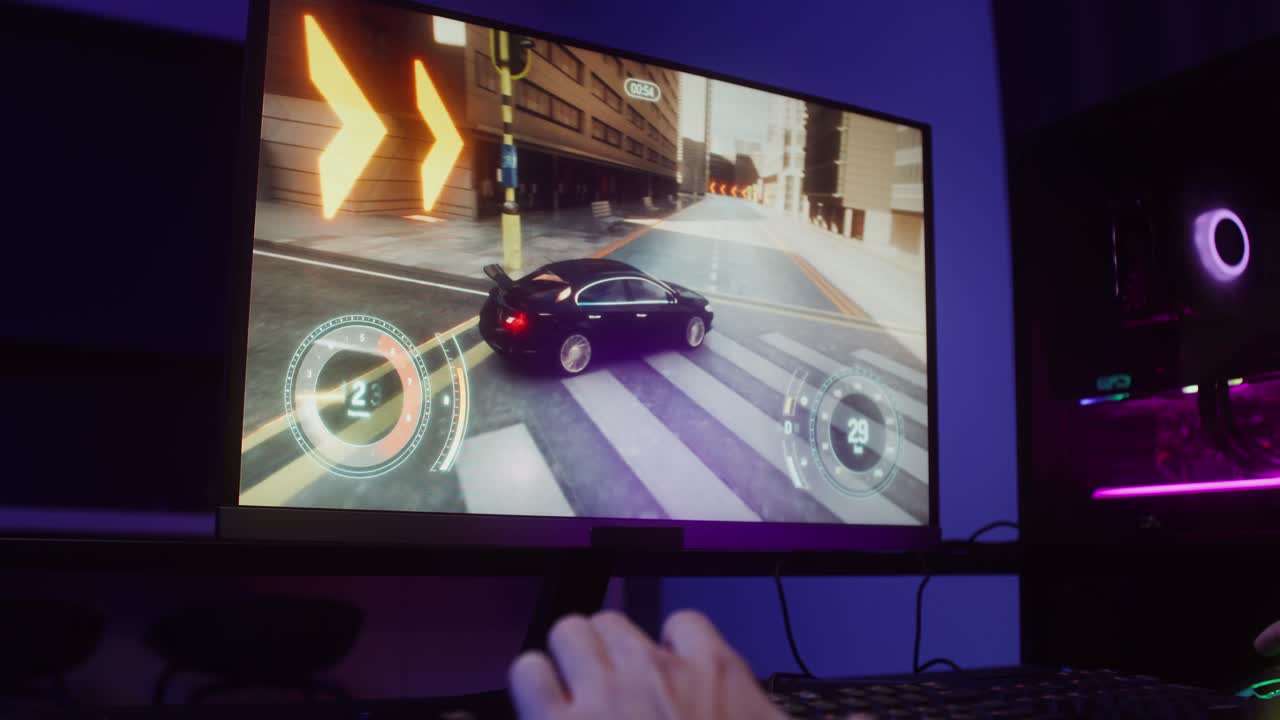 Gamer playing racing video game on PC