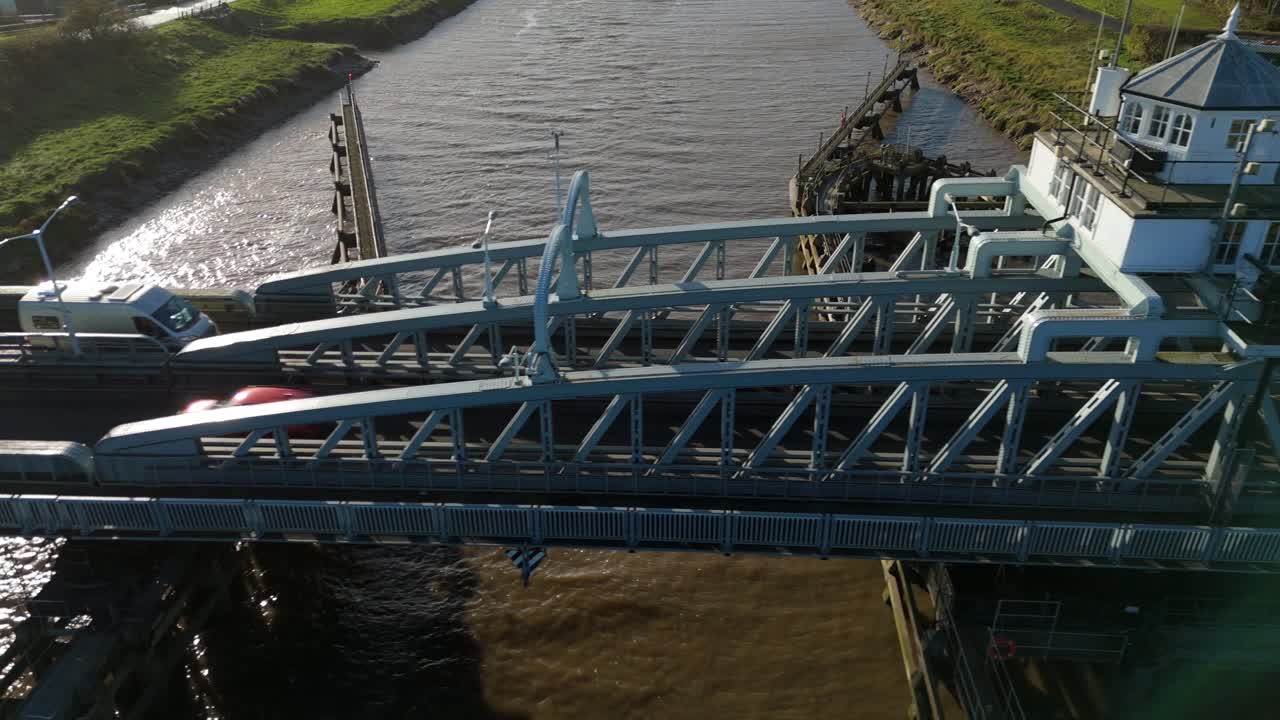 Wide Drone Perspective Of Major Transport Infrastructure Facilitating Vehicle And Ship Traffic At Sutton Bridge