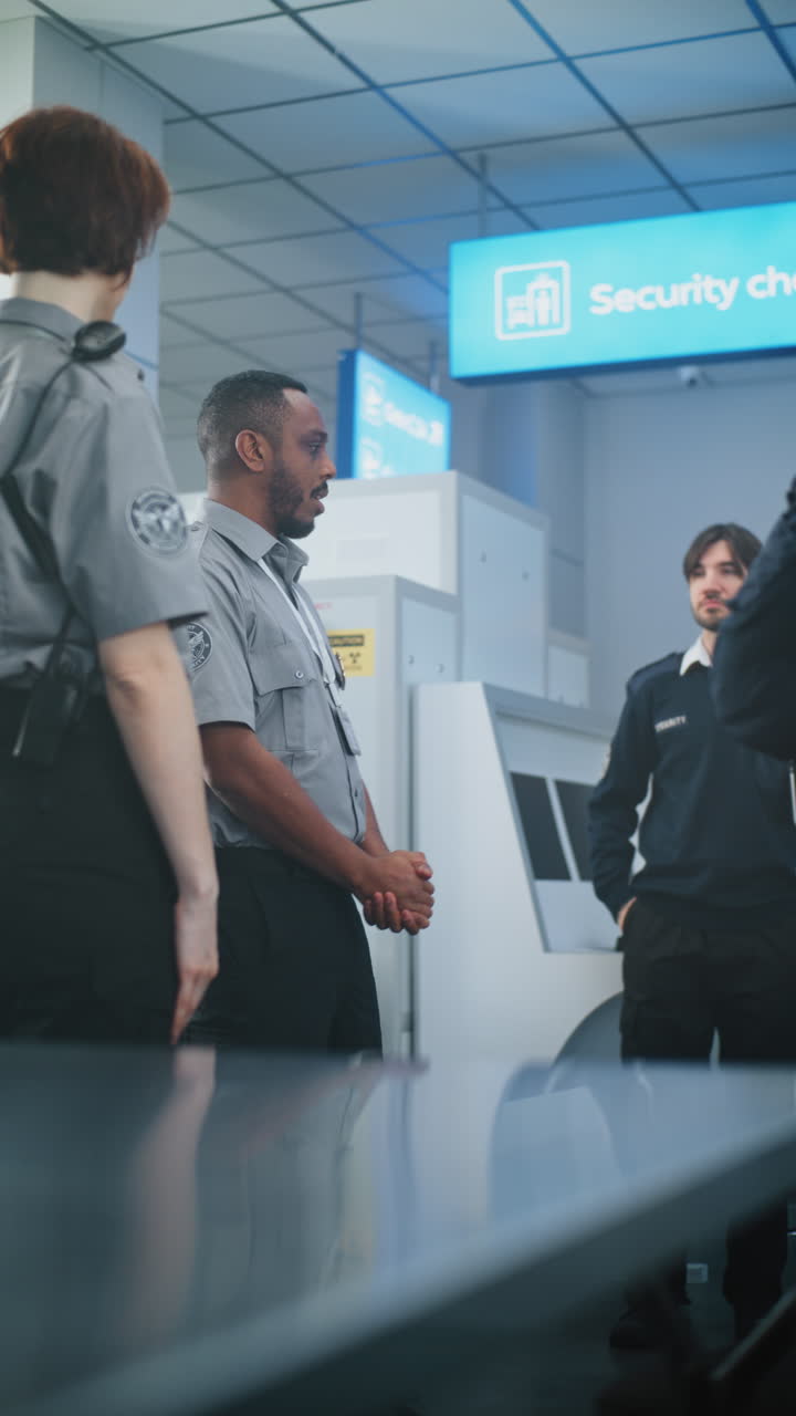 Airport Security Personnel in Discussion