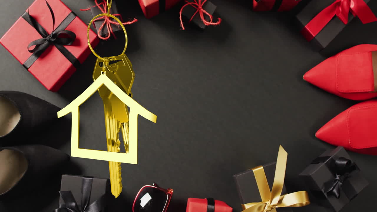 Christmas decorations with gifts and key animation over black background