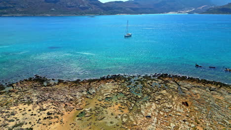 drone aerial shot of the beautiful crystal clear turquoise waters of the gramvousa peninsula in northwestern crete