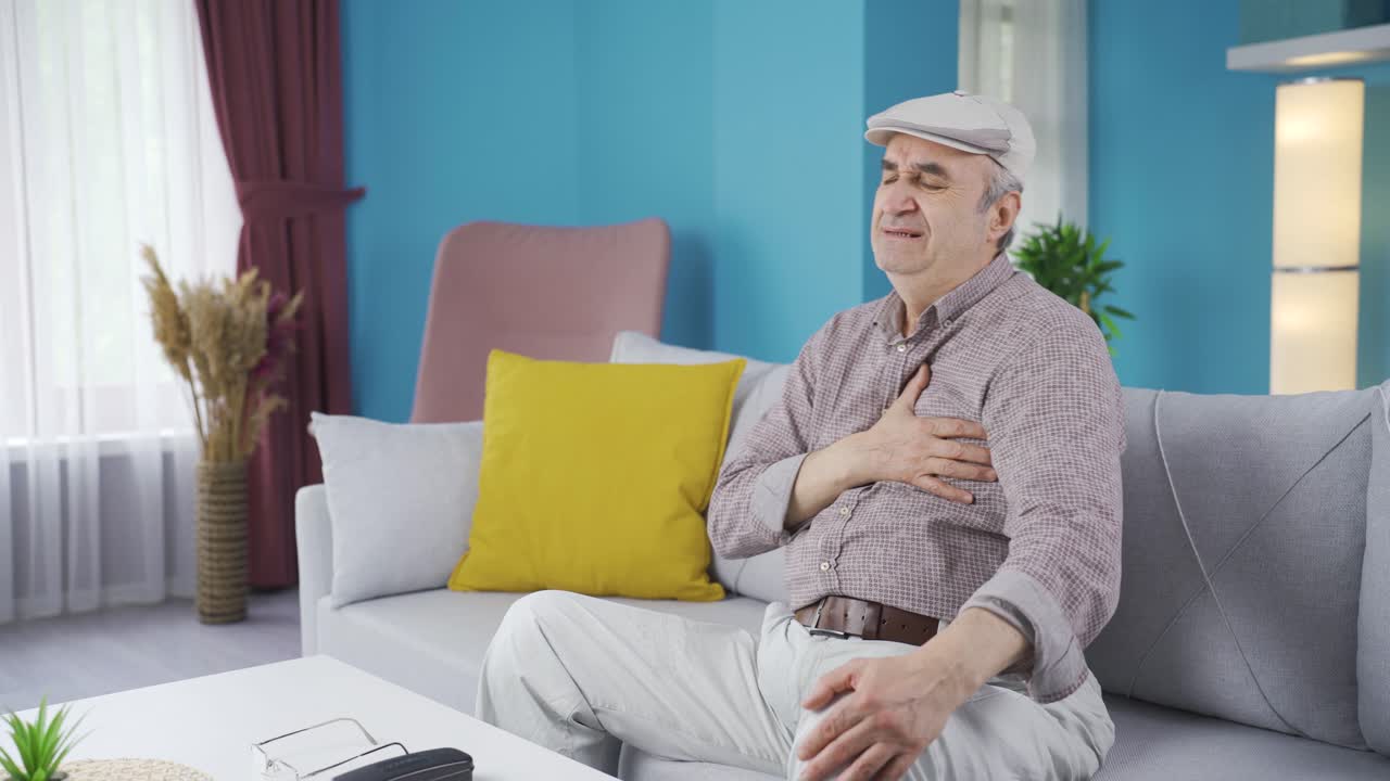 Old man having a heart attack. Patient.