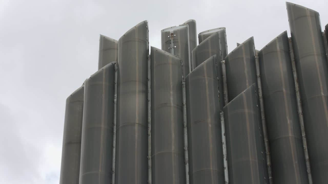 Grey Metal Structure with Vertical Pipes
