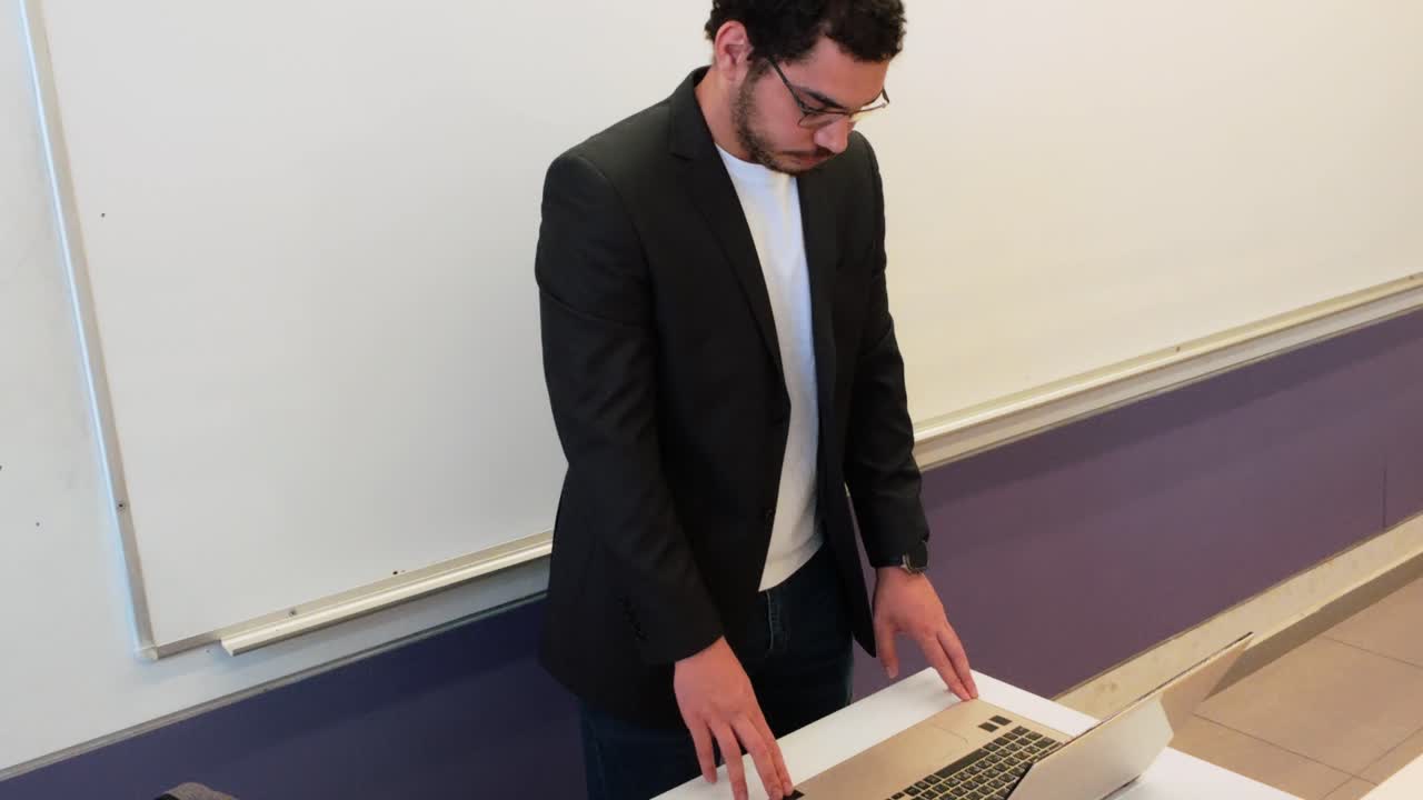 Academic Professional with Materials in Classroom