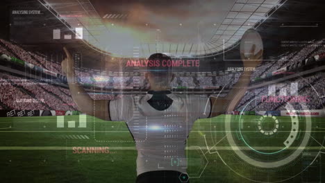 animation of data processing over caucasian rugby player at stadium