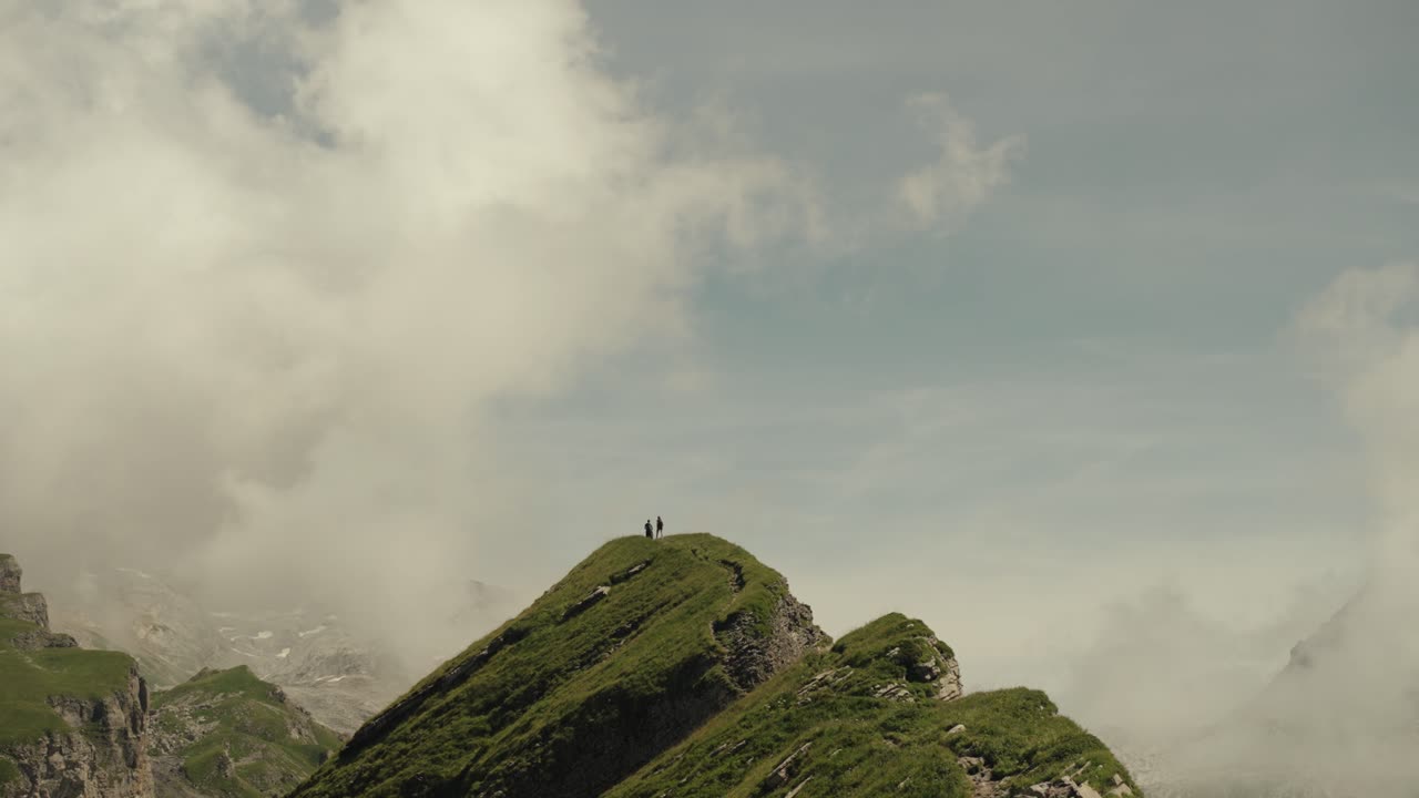 People on a mountain peak