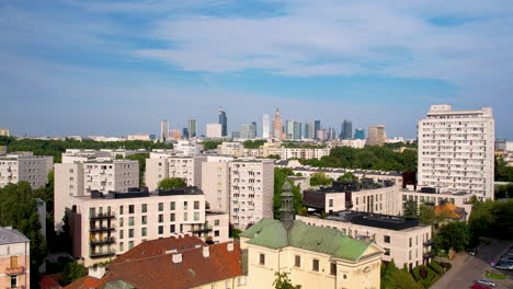 drone panorama of warsaw’s iconic palace and modern skyscrapers