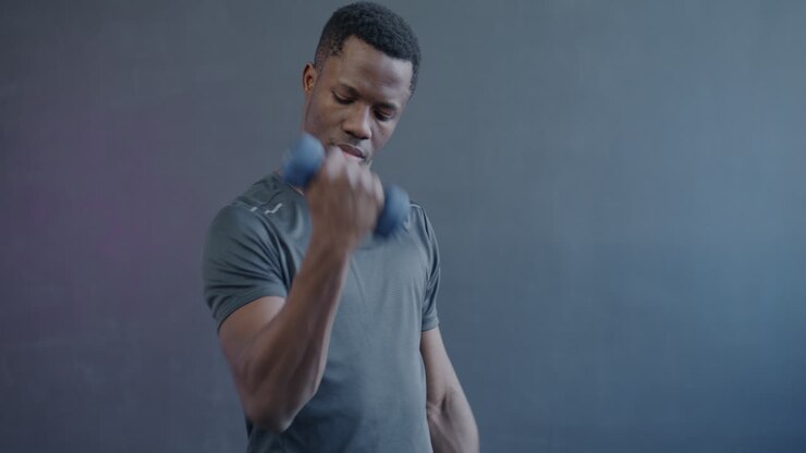 Man Lifting Dumbbells