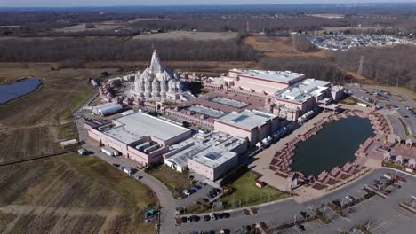 an aerial view of the shri swaminarayan mandir in robbinsville township, nj on a sunny day, it was closed for the day