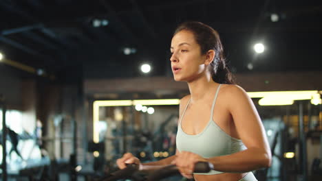 sporty girl warming up at gym