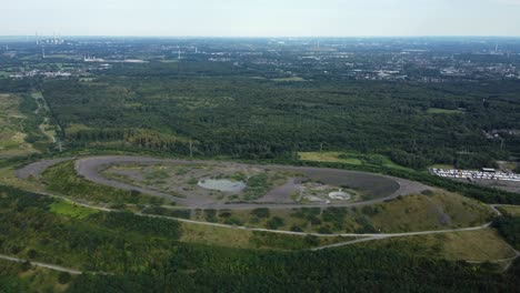 Aerial View of Landscape with Forest and Mine