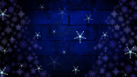 Animation-of-snow-falling-at-christmas-on-blue-background