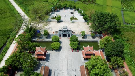 Drone-Flying-Over-Thai-Vi-Temple-in-Ninh-Binh,-Vietnam-Capturing-Beautiful-Temple-Rooftop