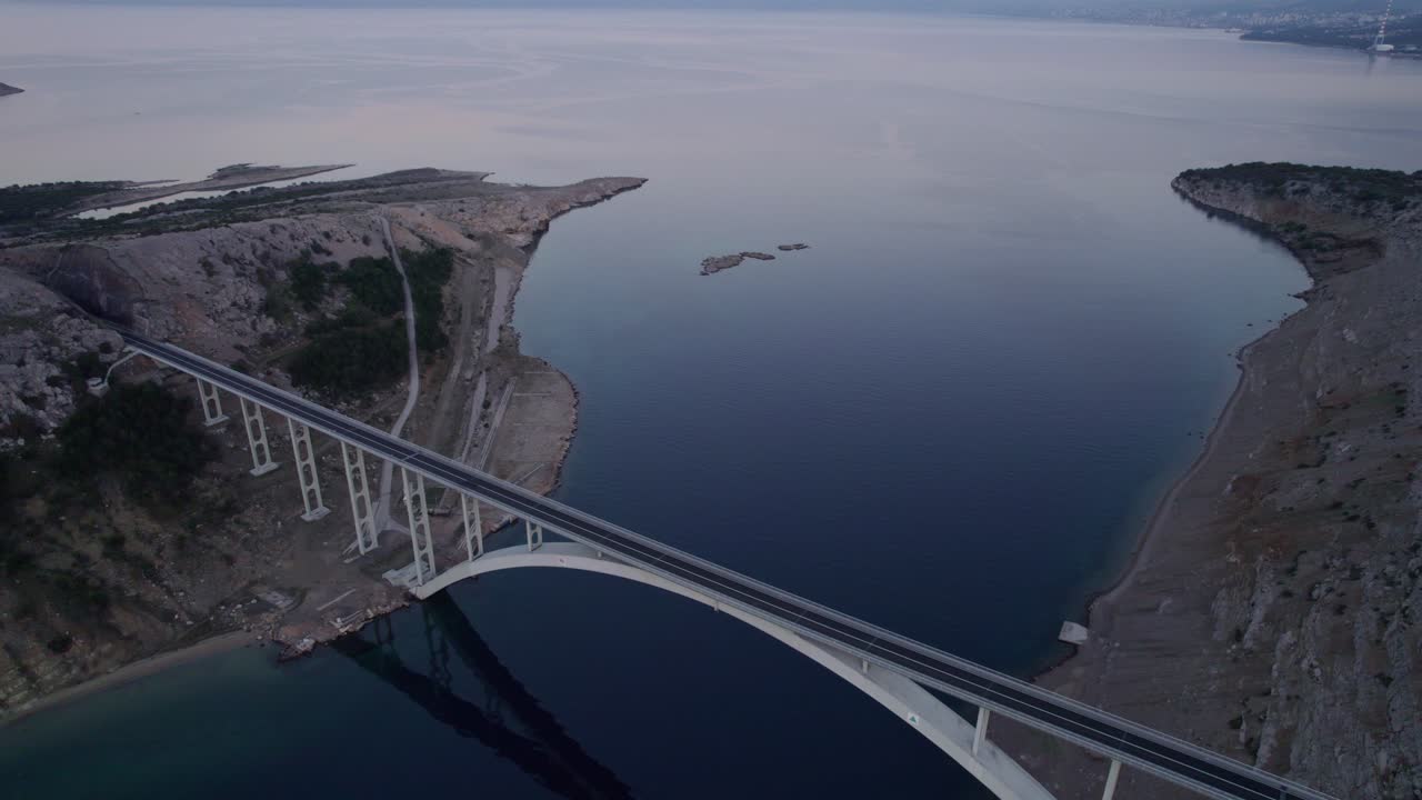 Krk's bridge with boats at dawn, Croatia