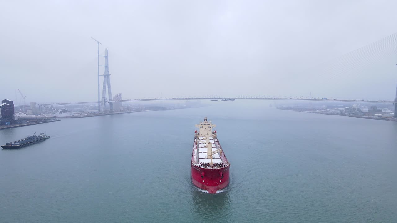 Large Cargo Ship on Detroit River with Gordie Howe International Bridge in background