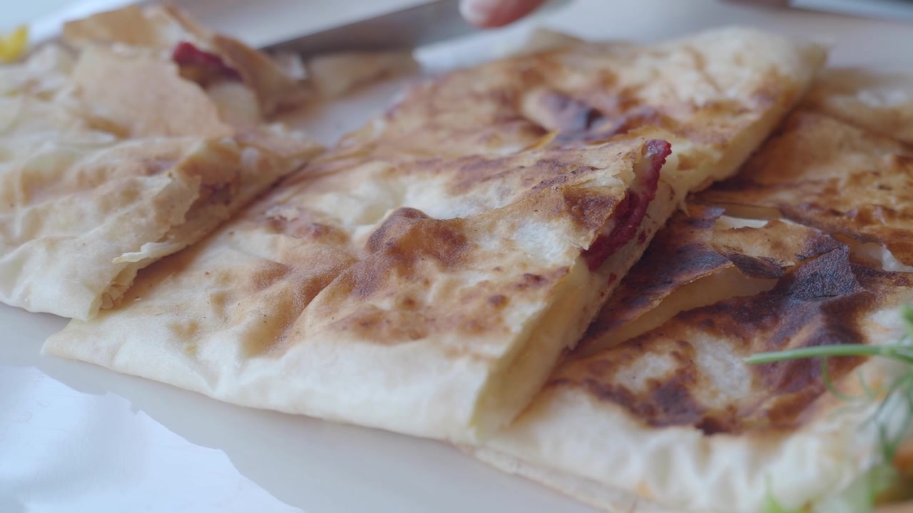Close-up of Sliced Turkish Gozleme on a Plate