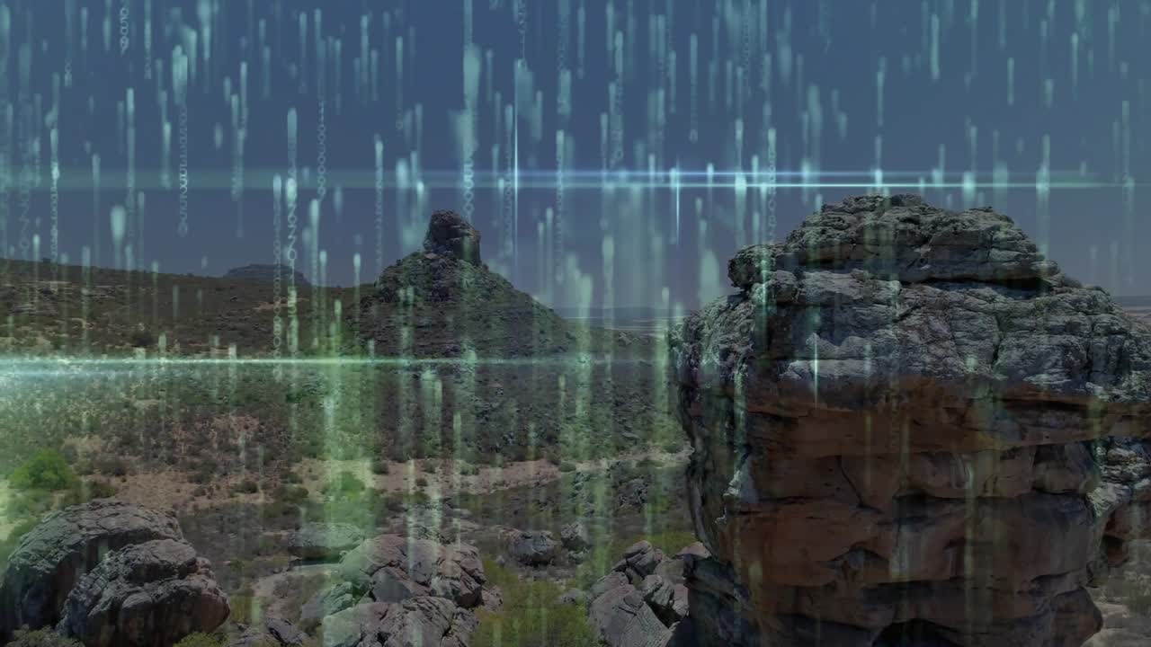Drone pulling back, panning left, showing sandstone outcrop and conical peak while streaks sliding