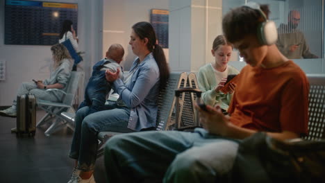 family waiting at airport